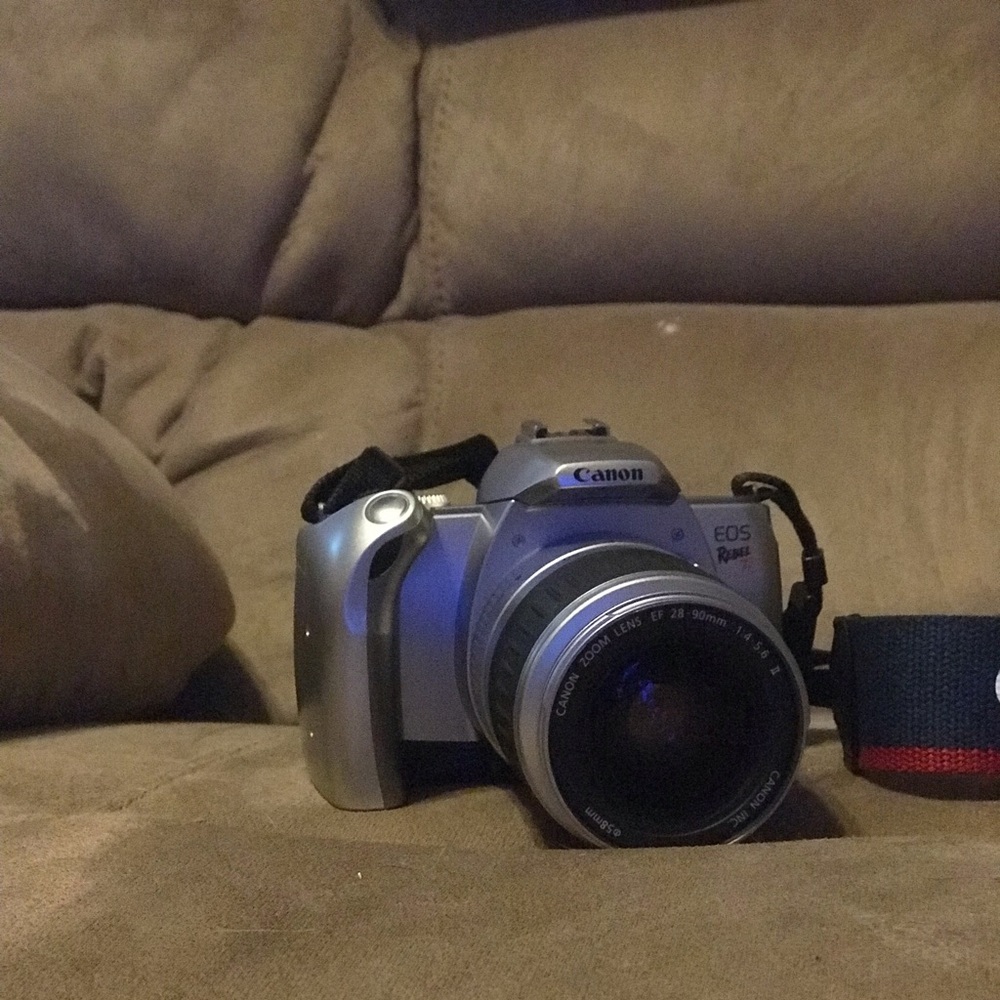 Digital camera, attachment and stand